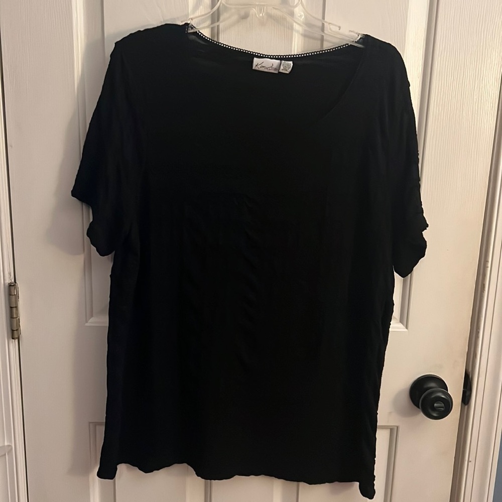 Kim Rogers black blouse